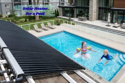Solar heater for a pool installed beside a backyard swimming pool.