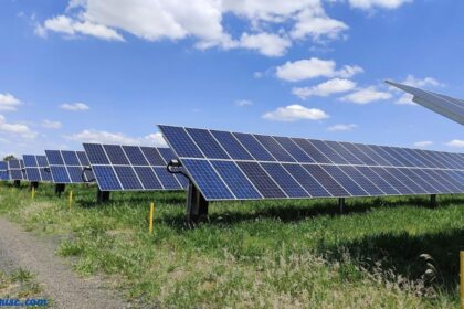 Solar panels teas passage showing rows of solar panels in a renewable energy project.