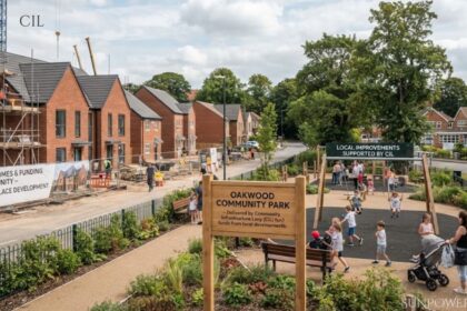 CIL development project showing new homes and community park improvements funded by the Community Infrastructure Levy.