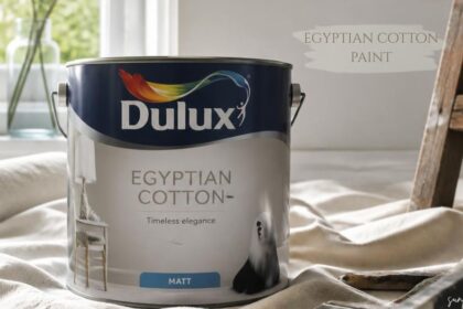 Egyptian cotton paint shown in a Dulux paint tin with decorating tools.