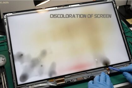 Discoloration of screen on a damaged monitor during repair